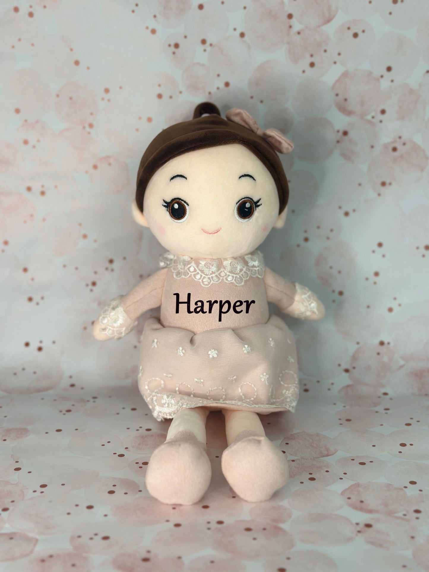 Lulaa plush doll in pink dress with custom name tag